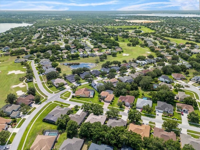 4013 Greystone Dr, Clermont, FL 34711 - aerial view of property's location featuring a nearby body of water, nearby suburban area, and a golf course