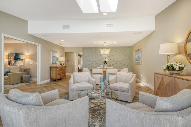 2103 Harbourside Dr Unit 1102, Longboat Key, FL 34228 - living room featuring a skylight and recessed lighting