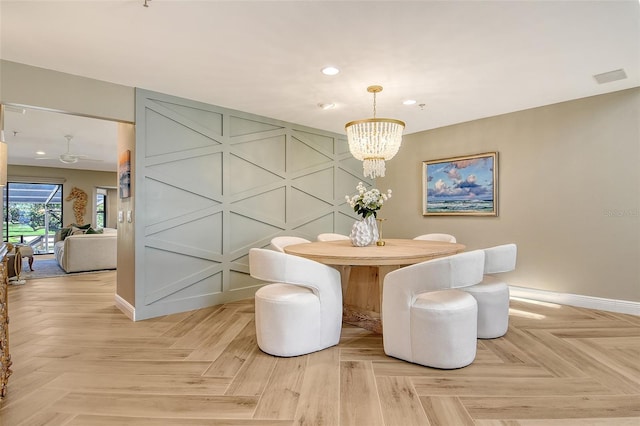 2103 Harbourside Dr Unit 1102, Longboat Key, FL 34228 - dining room with a chandelier and recessed lighting