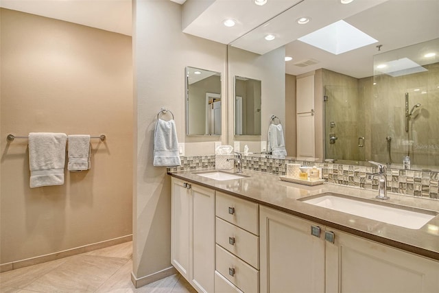 2103 Harbourside Dr Unit 1102, Longboat Key, FL 34228 - full bath with a skylight, double vanity, a shower stall, recessed lighting, and tasteful backsplash