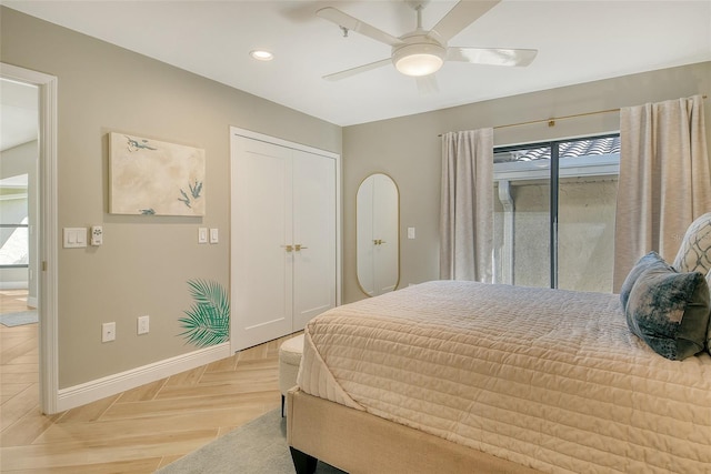 2103 Harbourside Dr Unit 1102, Longboat Key, FL 34228 - bedroom with multiple windows, recessed lighting, ceiling fan, and a closet