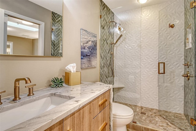 2103 Harbourside Dr Unit 1102, Longboat Key, FL 34228 - bathroom featuring a stall shower and vanity