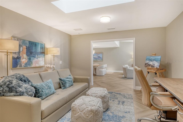 2103 Harbourside Dr Unit 1102, Longboat Key, FL 34228 - living room featuring a skylight and baseboards