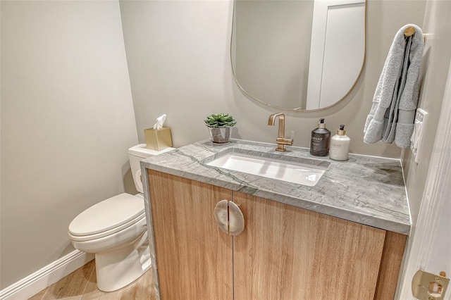 2103 Harbourside Dr Unit 1102, Longboat Key, FL 34228 - half bathroom with vanity and toilet