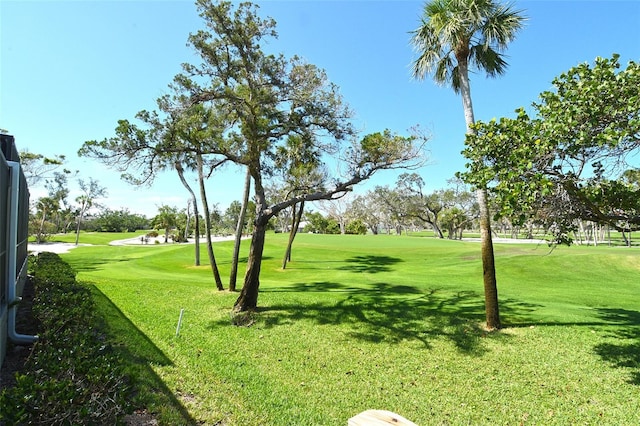 2103 Harbourside Dr Unit 1102, Longboat Key, FL 34228 - view of property's community with view of golf course and a lawn