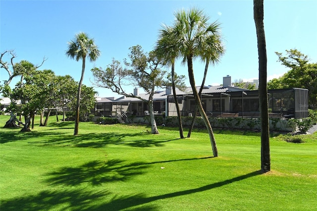 2103 Harbourside Dr Unit 1102, Longboat Key, FL 34228 - view of community featuring a yard