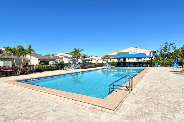 2103 Harbourside Dr Unit 1102, Longboat Key, FL 34228 - community pool featuring a patio
