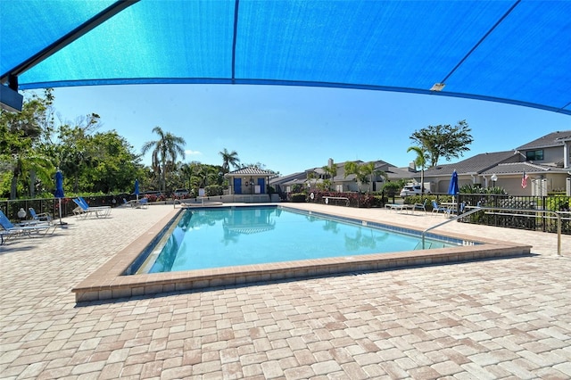 2103 Harbourside Dr Unit 1102, Longboat Key, FL 34228 - community pool with a patio and a residential view