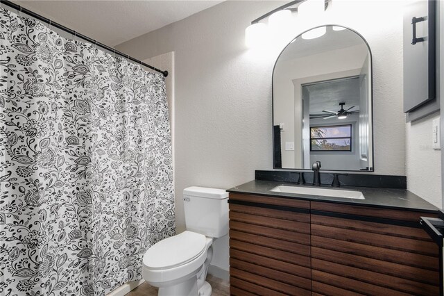 2395 Harbor Blvd Unit 314, Port Charlotte, FL 33952 - bathroom featuring vanity, a ceiling fan, and a shower with curtain