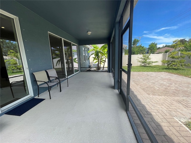4428 Conchfish Ln, Osprey, FL 34229 - unfurnished sunroom featuring healthy amount of natural light