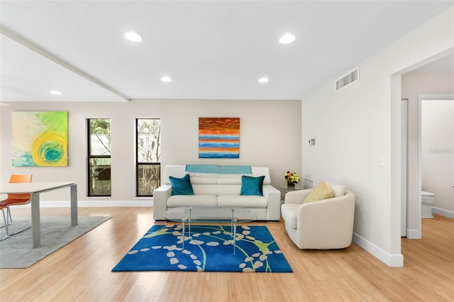 1347 Landings Dr Unit 6, Sarasota, FL 34231 - living room featuring wood finished floors and recessed lighting
