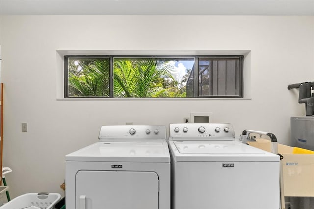 1347 Landings Dr Unit 6, Sarasota, FL 34231 - laundry area featuring separate washer and dryer