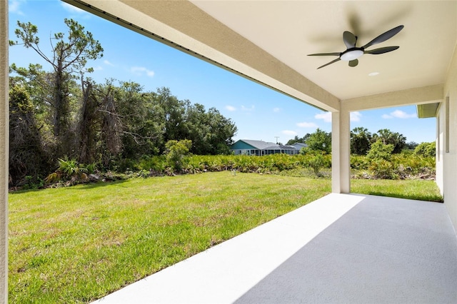 1532 Maricopa Rd, North Port, FL 34287 - view of grassy yard featuring ceiling fan and a patio area