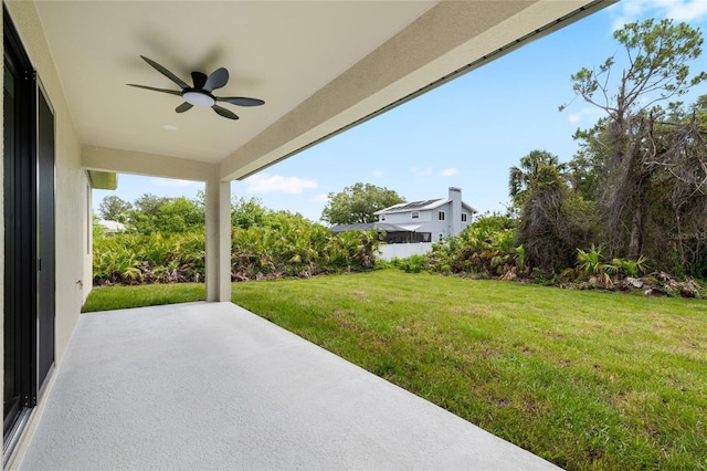 1532 Maricopa Rd, North Port, FL 34287 - view of grassy yard with ceiling fan and a patio area