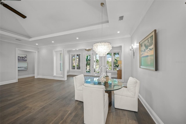 5569 Cape Leyte Dr, Sarasota, FL 34242 - dining space featuring a chandelier, dark wood finished floors, recessed lighting, a ceiling fan, and crown molding