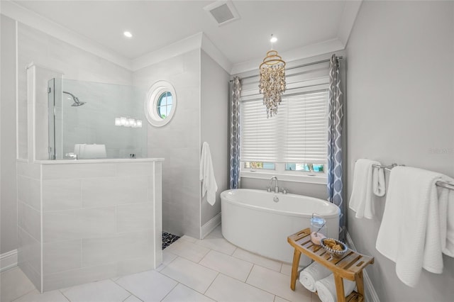 5569 Cape Leyte Dr, Sarasota, FL 34242 - bathroom featuring a walk in shower, a soaking tub, tile patterned flooring, and recessed lighting