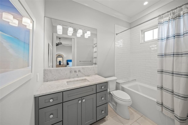 5569 Cape Leyte Dr, Sarasota, FL 34242 - full bathroom with vanity, shower / tub combo, ceiling fan, tile patterned floors, and ensuite bath