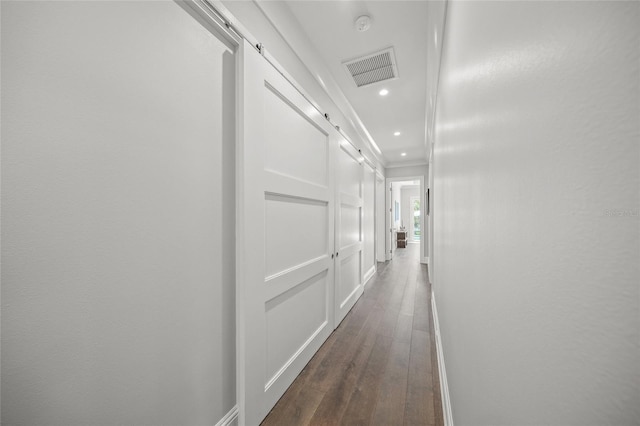 5569 Cape Leyte Dr, Sarasota, FL 34242 - hall featuring dark wood-style floors and recessed lighting