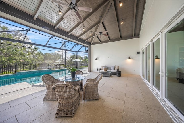 5569 Cape Leyte Dr, Sarasota, FL 34242 - view of patio with ceiling fan, an outdoor hangout area, and glass enclosure
