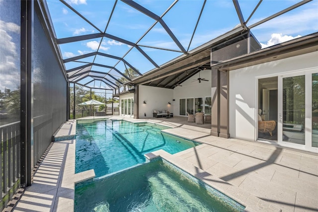 5569 Cape Leyte Dr, Sarasota, FL 34242 - view of pool featuring a patio, a pool with connected hot tub, a ceiling fan, and glass enclosure
