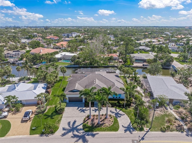 5569 Cape Leyte Dr, Sarasota, FL 34242 - aerial perspective of suburban area featuring a large body of water