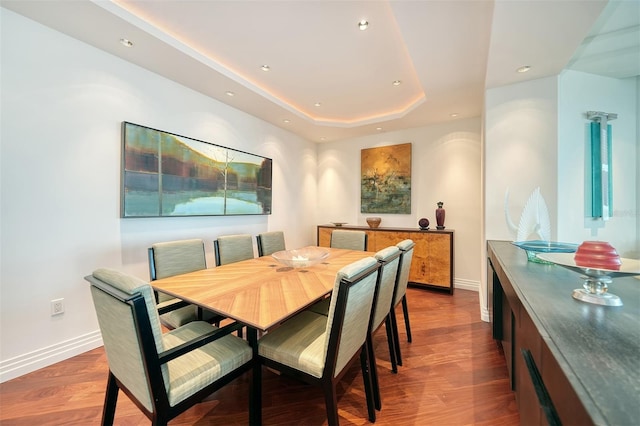 990 Blvd Of The Arts Unit 801, Sarasota, FL 34236 - dining area with wood finished floors, a raised ceiling, and recessed lighting