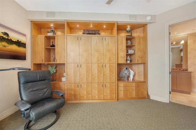 990 Blvd Of The Arts Unit 801, Sarasota, FL 34236 - living area with carpet and baseboards