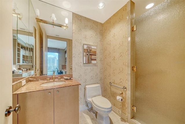 990 Blvd Of The Arts Unit 801, Sarasota, FL 34236 - bathroom with a shower stall, vanity, and tile patterned flooring