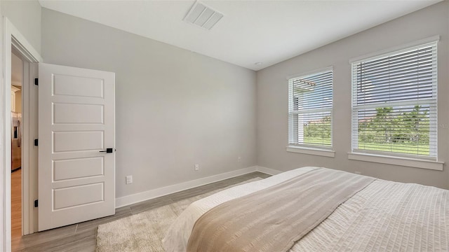 491 Daylily Blvd, Nokomis, FL 34275 - bedroom with wood finished floors and baseboards