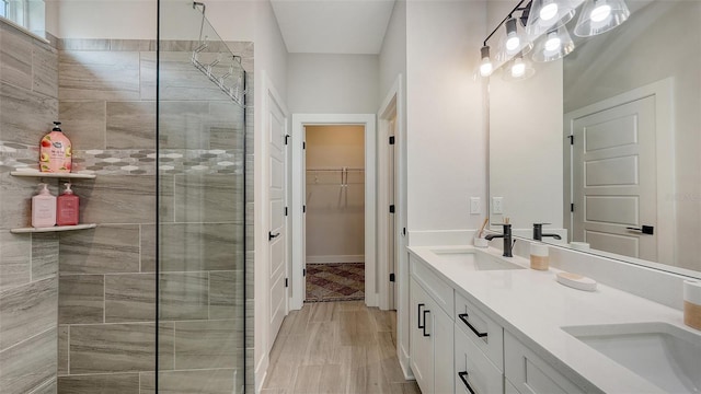 491 Daylily Blvd, Nokomis, FL 34275 - full bath with a shower stall, double vanity, and a spacious closet