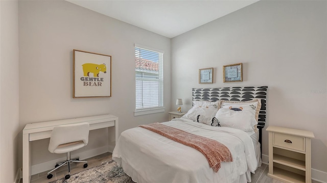 491 Daylily Blvd, Nokomis, FL 34275 - bedroom with wood finished floors and an office area
