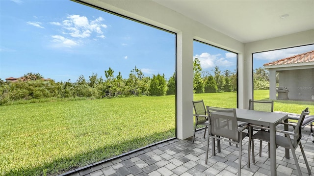 491 Daylily Blvd, Nokomis, FL 34275 - sunroom featuring outdoor dining space