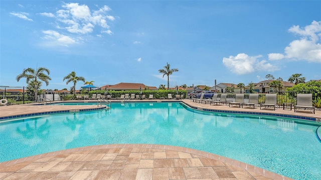 491 Daylily Blvd, Nokomis, FL 34275 - community pool with a patio area