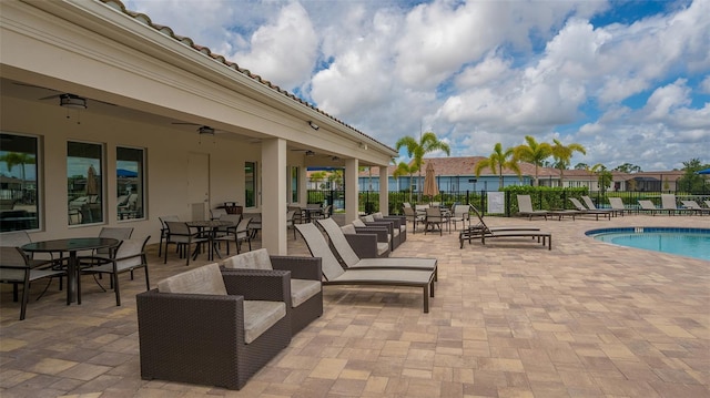 491 Daylily Blvd, Nokomis, FL 34275 - community pool with ceiling fan and a patio area
