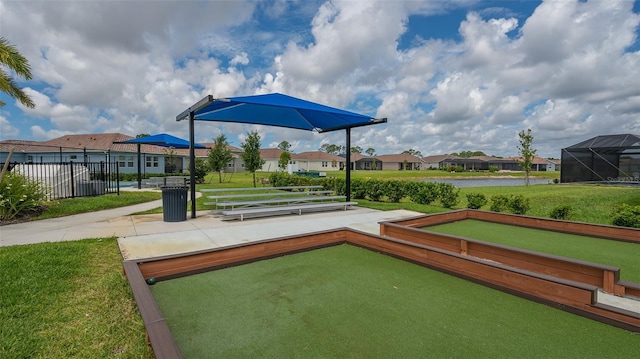 491 Daylily Blvd, Nokomis, FL 34275 - surrounding community featuring a bocce ball area and a residential view