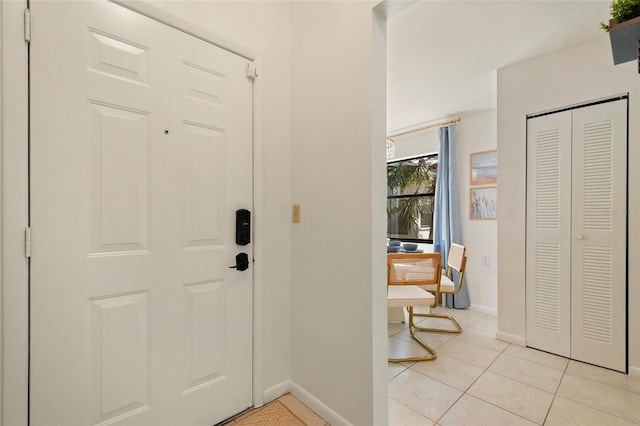 4411 46th Ave W Unit 201, Bradenton, FL 34210 - entrance foyer with baseboards and light tile patterned flooring