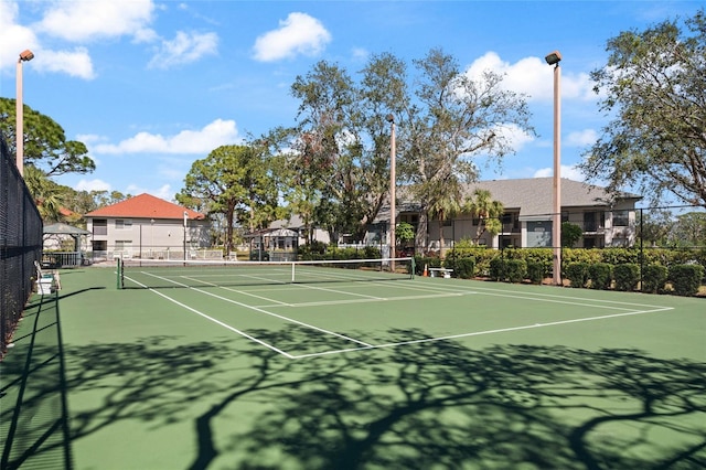 4411 46th Ave W Unit 201, Bradenton, FL 34210 - view of tennis court with community basketball court