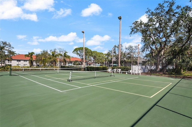 4411 46th Ave W Unit 201, Bradenton, FL 34210 - view of tennis court with community basketball court