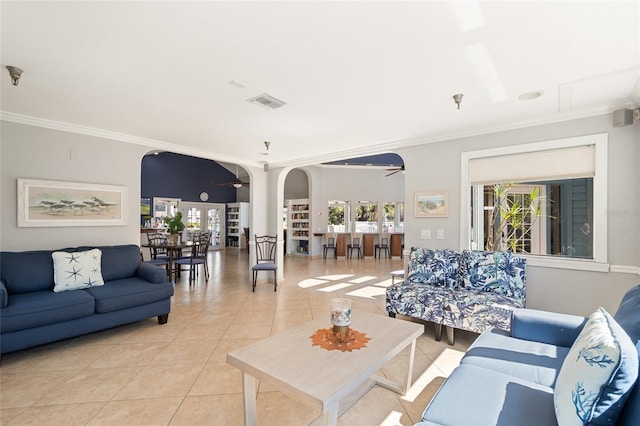 4411 46th Ave W Unit 201, Bradenton, FL 34210 - living room featuring french doors, light tile patterned floors, crown molding, and a ceiling fan