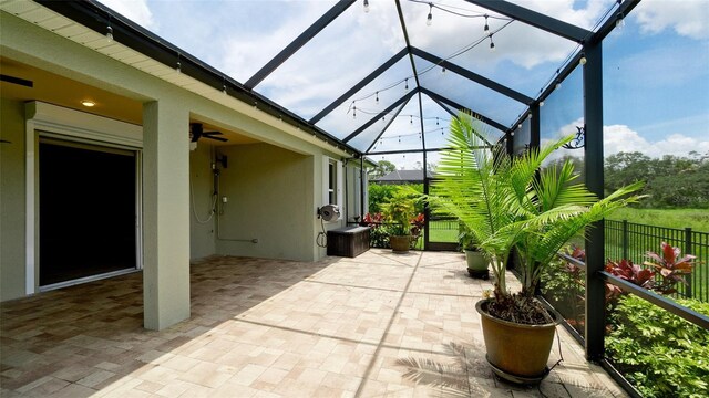 7364 47th Avenue Cir E, Bradenton, FL 34203 - view of patio with glass enclosure and ceiling fan