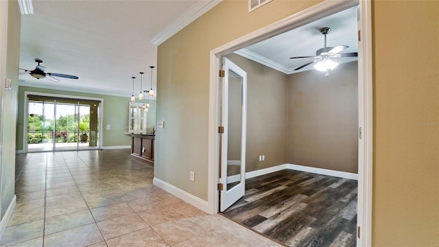 7364 47th Avenue Cir E, Bradenton, FL 34203 - hall featuring crown molding and baseboards