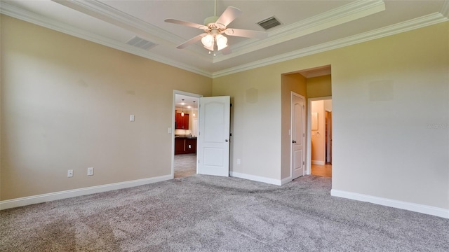 7364 47th Avenue Cir E, Bradenton, FL 34203 - unfurnished bedroom featuring carpet floors, crown molding, a raised ceiling, and a ceiling fan