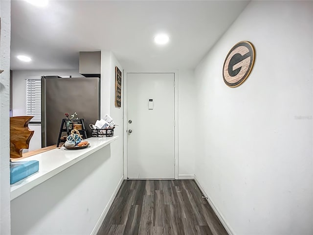 3700 S Osprey Ave Unit 122, Sarasota, FL 34239 - corridor featuring dark wood-style flooring and baseboards