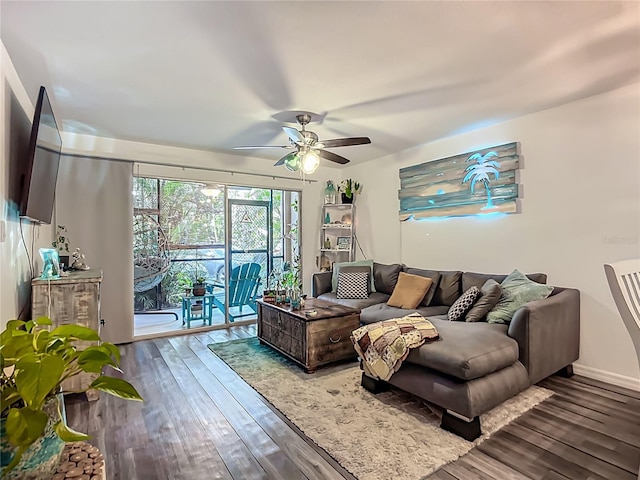 3700 S Osprey Ave Unit 122, Sarasota, FL 34239 - living area featuring a ceiling fan and wood finished floors