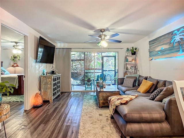 3700 S Osprey Ave Unit 122, Sarasota, FL 34239 - living room featuring a ceiling fan and wood finished floors