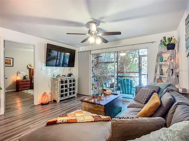3700 S Osprey Ave Unit 122, Sarasota, FL 34239 - living room featuring a ceiling fan and wood finished floors