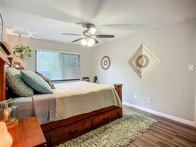 3700 S Osprey Ave Unit 122, Sarasota, FL 34239 - bedroom with wood finished floors and ceiling fan