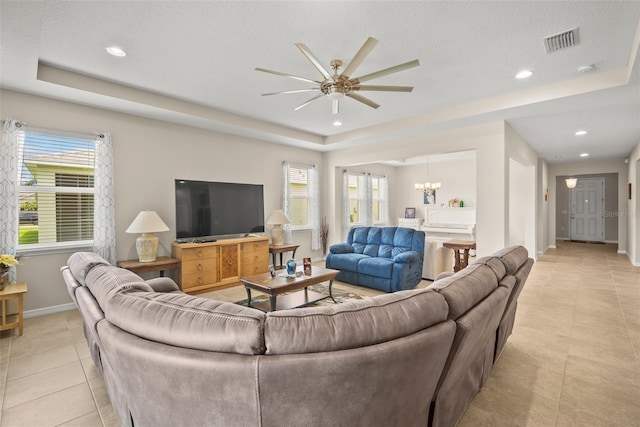 226 Tapa Parish Run, Bradenton, FL 34212 - living area featuring light tile patterned flooring, healthy amount of natural light, ceiling fan, a chandelier, and recessed lighting