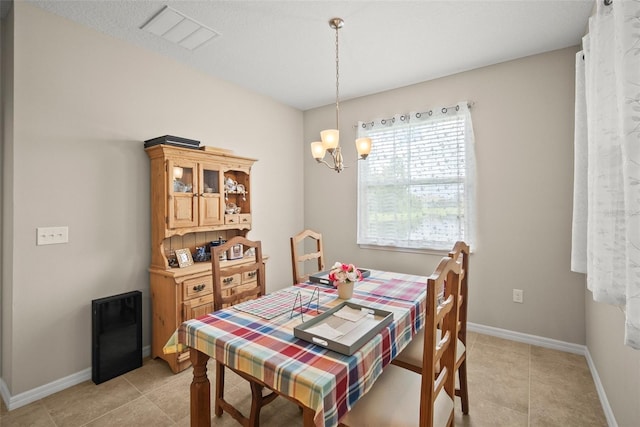 226 Tapa Parish Run, Bradenton, FL 34212 - dining room featuring a chandelier and light tile patterned floors
