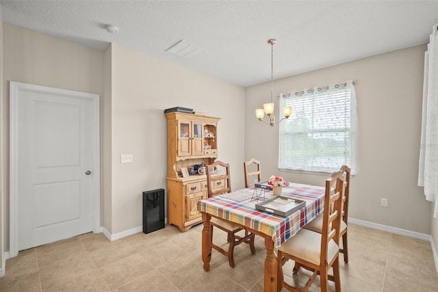 226 Tapa Parish Run, Bradenton, FL 34212 - dining space with a chandelier and light tile patterned floors